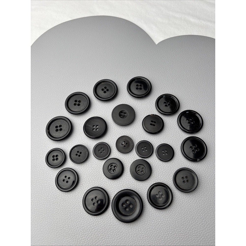 Vintage black button lot — 23‎ Assorted 4-hole sew-through styles.